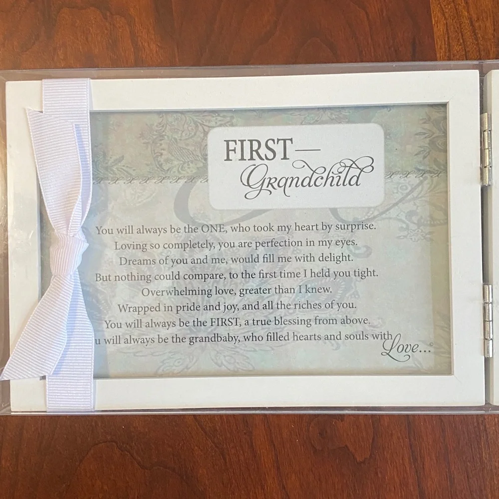 Double picture frame. 5 1/2 x 3 1/2 each side. First Grandchild. NWT